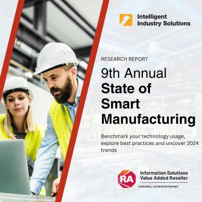State of Smart Manufacturing Report with man and woman in hard hats looking at a laptop 