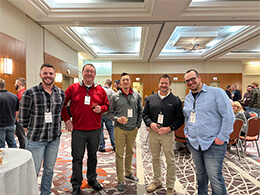 Cameron Benning, Rod Kettles, Lance Symonds and Ed Zink met  with Lyell Hablitzel of Mars Petcare at the Kirby Risk Automation Fair Welcome Reception. 